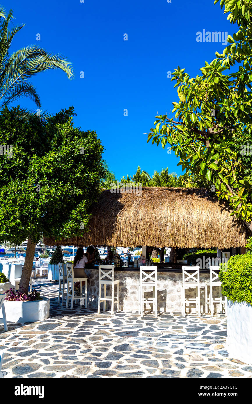 Tiki style straw roof bar at Yacht Classic Hotel, Ece Marina, Fethiye, Turkish Riviera, Turkey Stock Photo