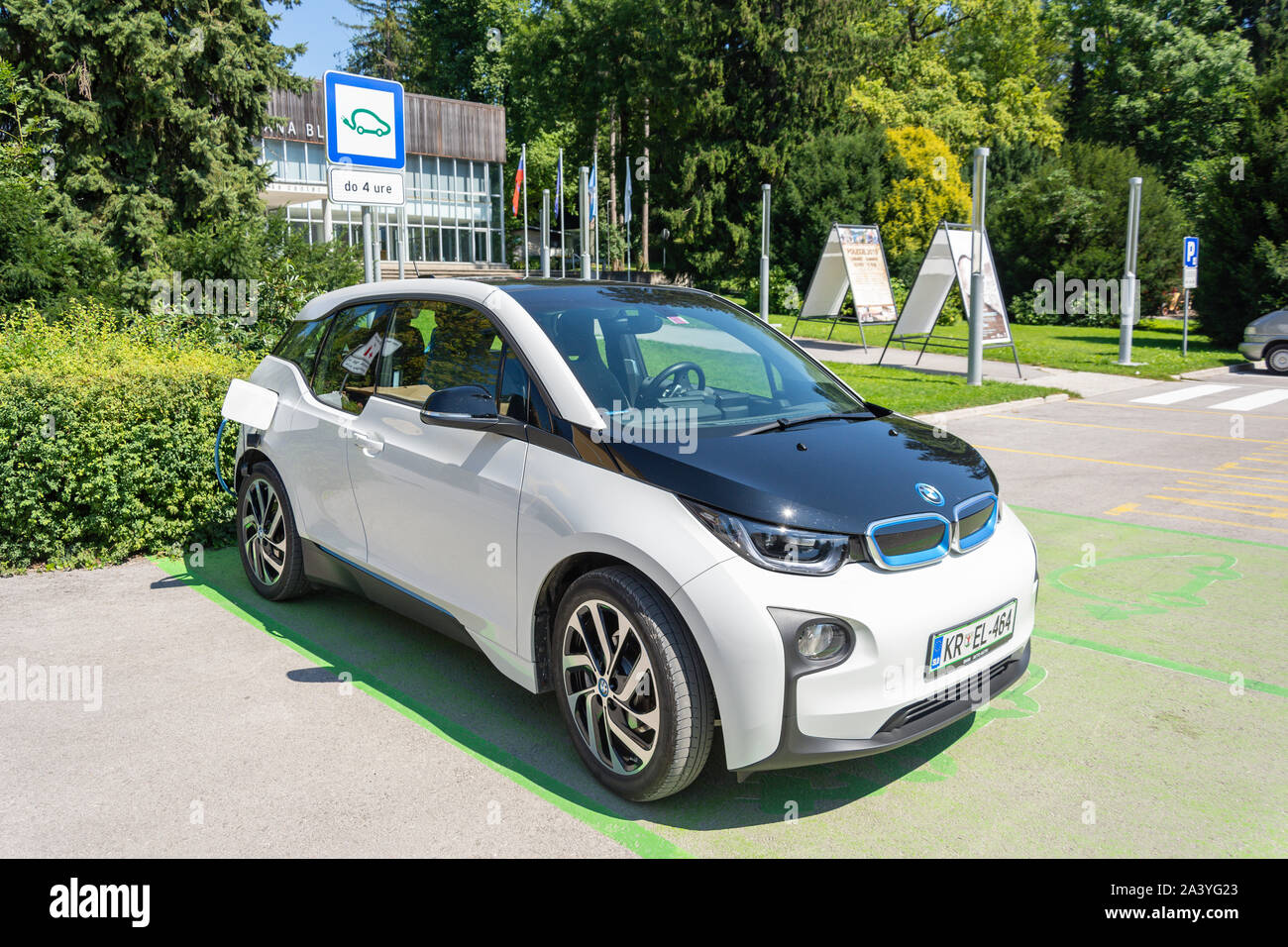 BMWi3 electric car at charging unit, Cesta svobode, Lake Bled, Bled, Upper Carniola Region, Slovenia Stock Photo