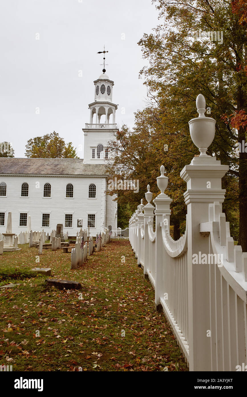 Bennington Centre Cemetery on a cold Fall day with Old First Church in the distance.  Bennington, Vermont Stock Photo
