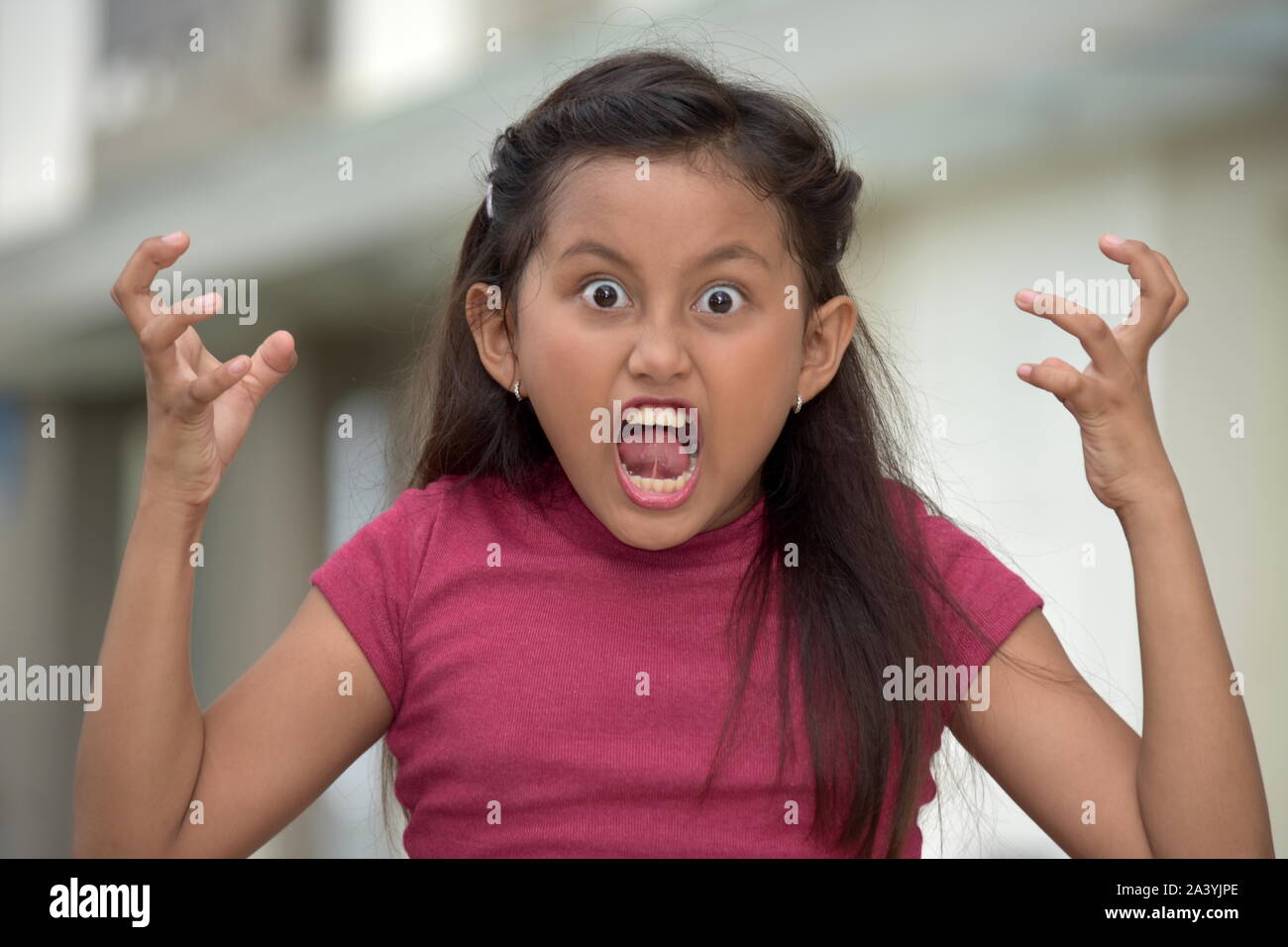 Stressed Young Asian Child Stock Photo