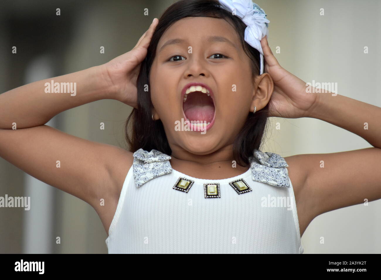 Cute Asian Girl Under Stress Stock Photo Alamy