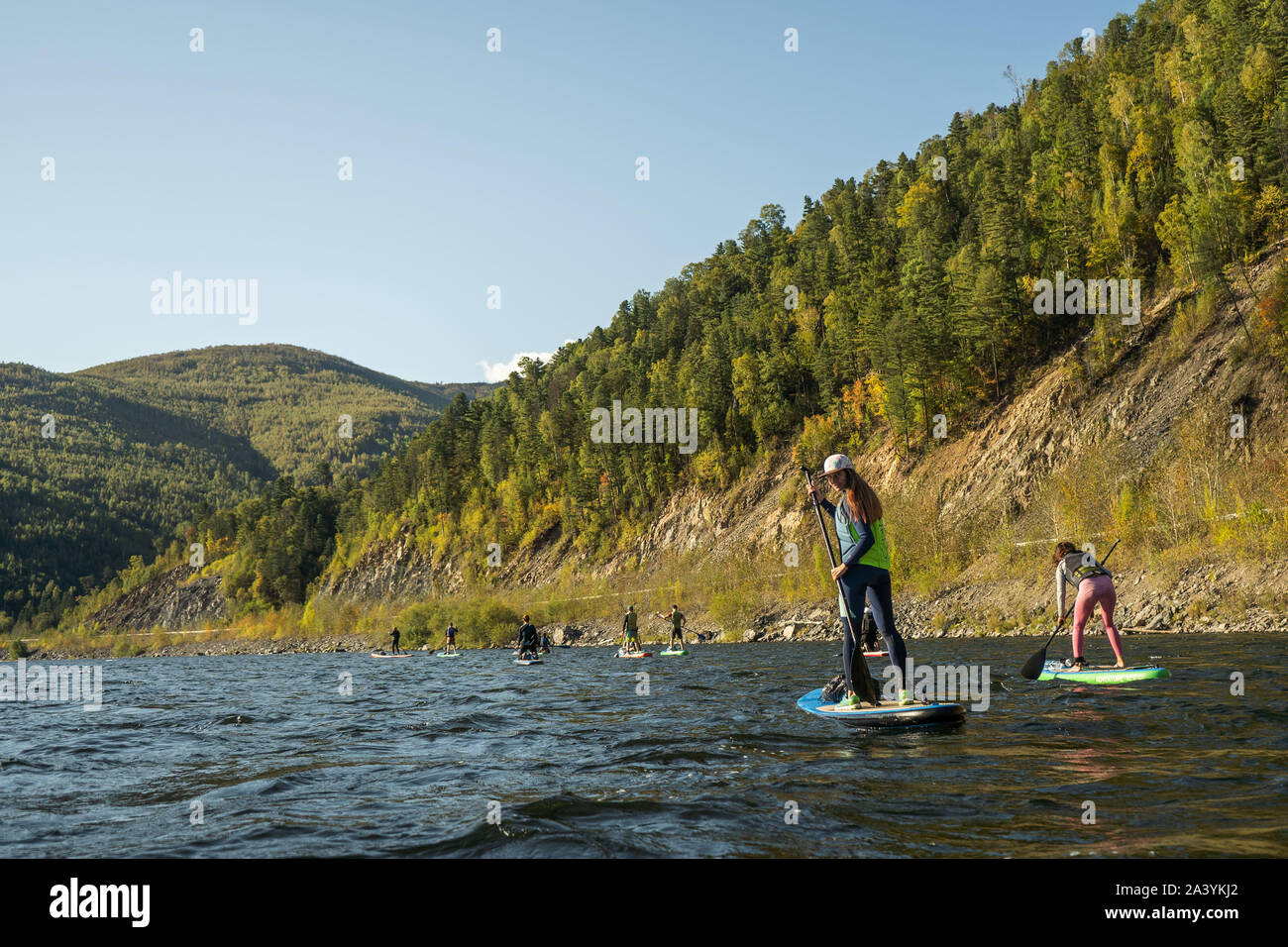 Man paddling surfboard kayak hires stock photography and images Alamy