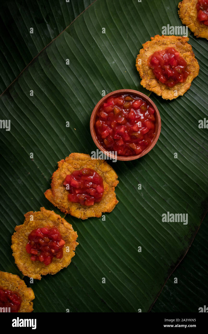 Deep fried banana fritters on banana leaves Stock Photo Alamy