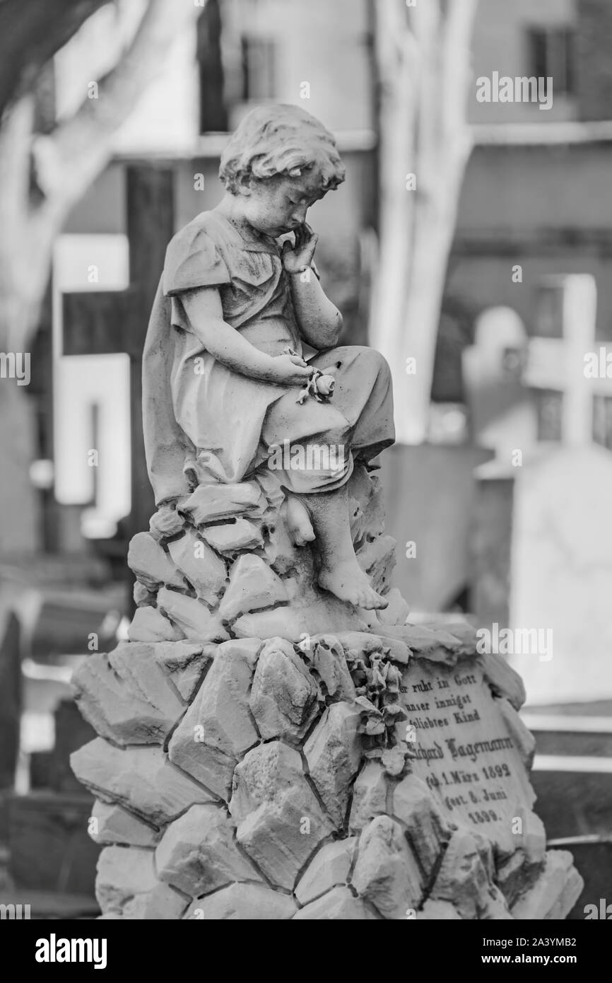 Boy sculpture at cemetery, montevideo city, uruguay Stock Photo
