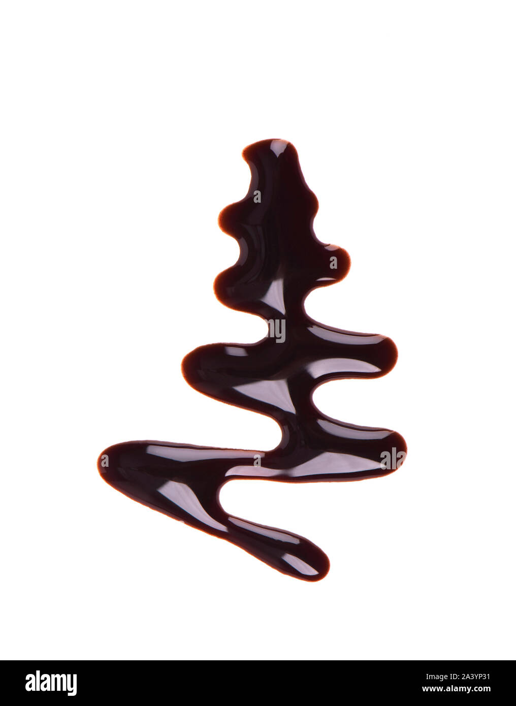 Chocolate syrup drop isolated on white background. Top view. Stock Photo