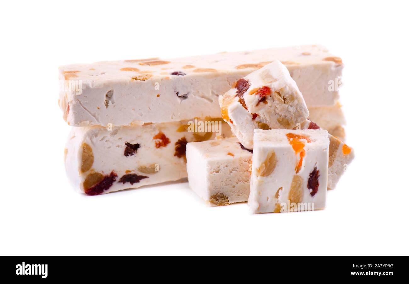 Nut nougat with dried fruit, sweet candy isolated on white background