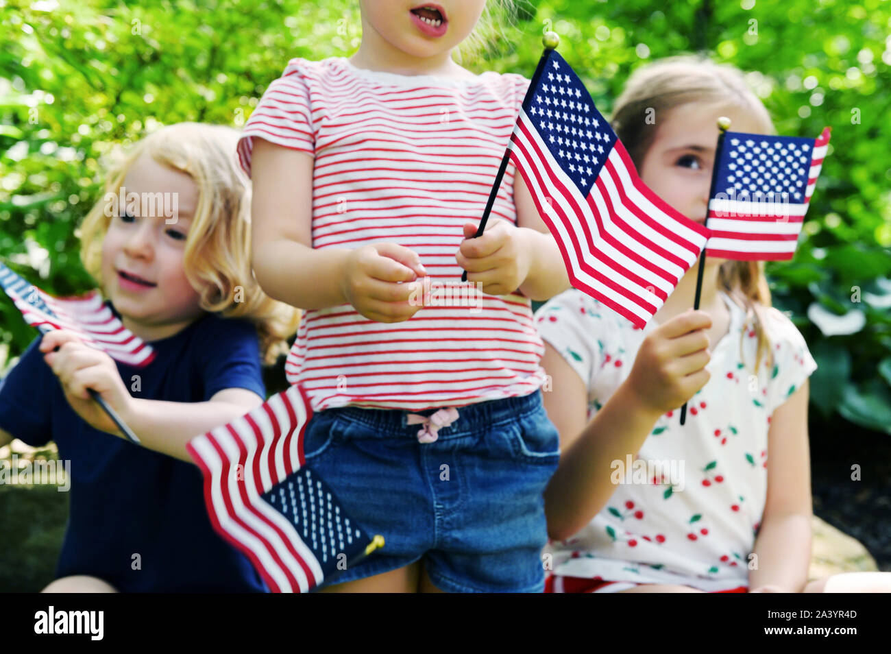 Children holding American flags Stock Photo