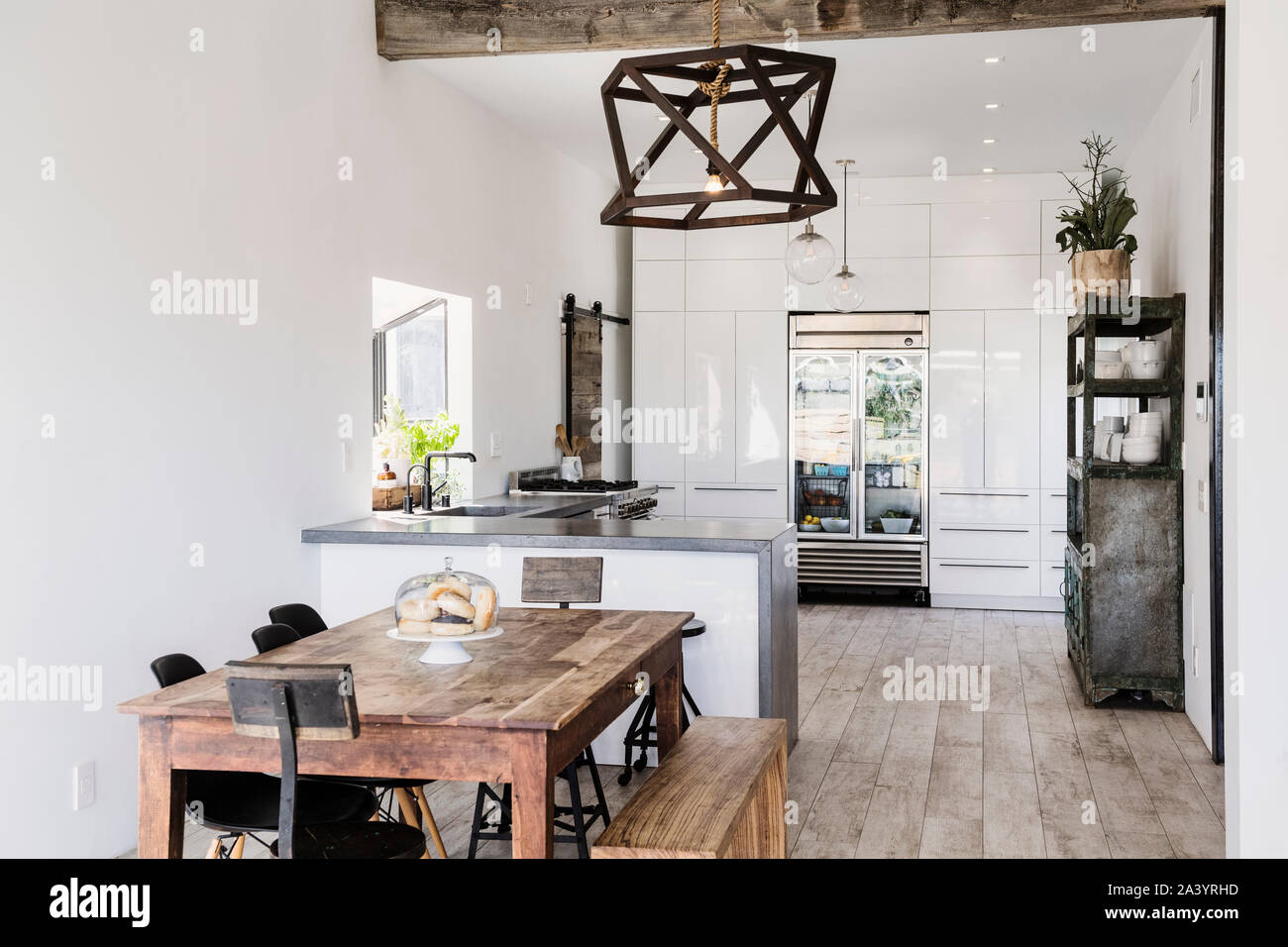 Open plan kitchen and dining room Stock Photo - Alamy