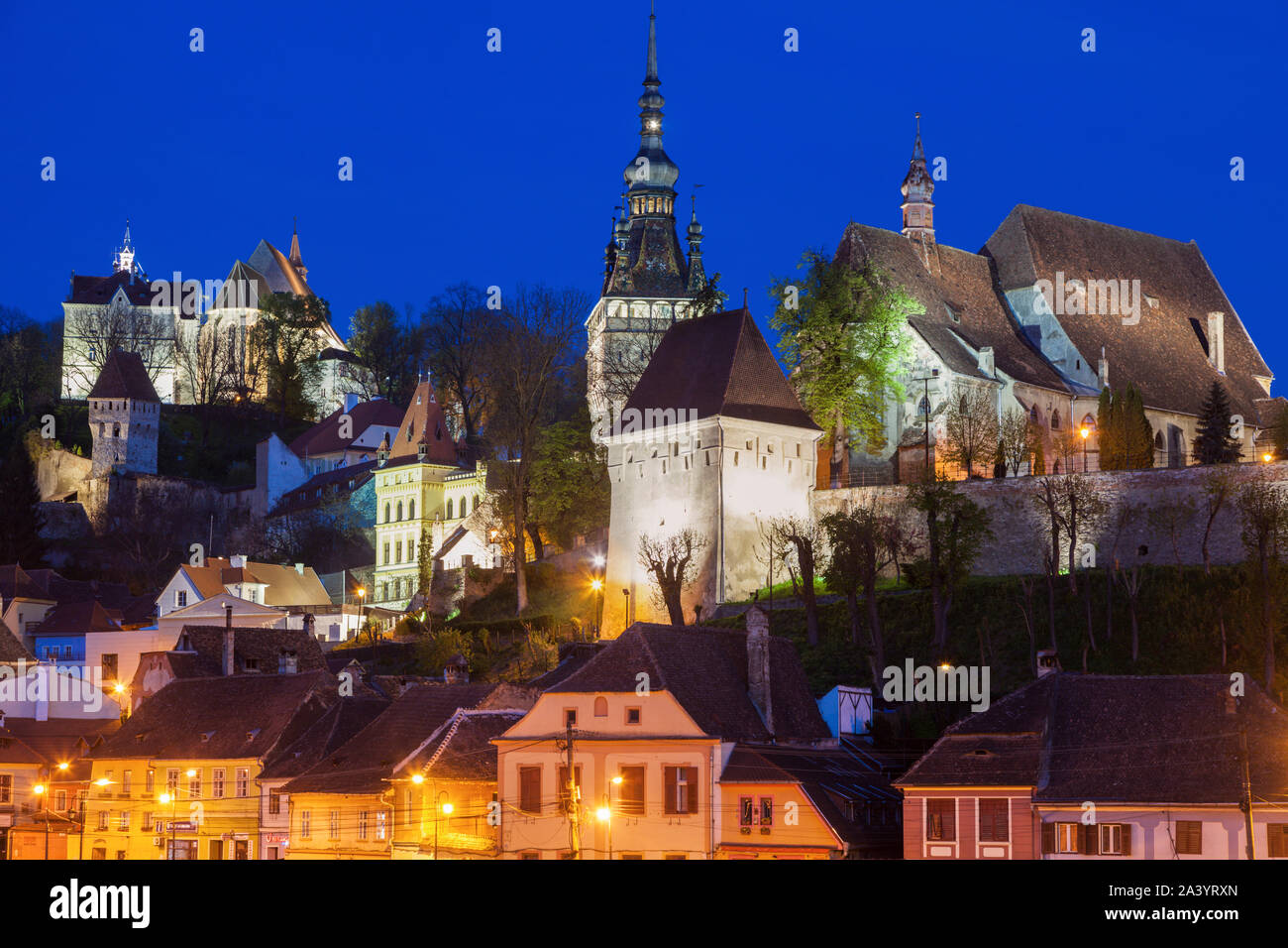 Old town at night in Sighisoara, Romania Stock Photo
