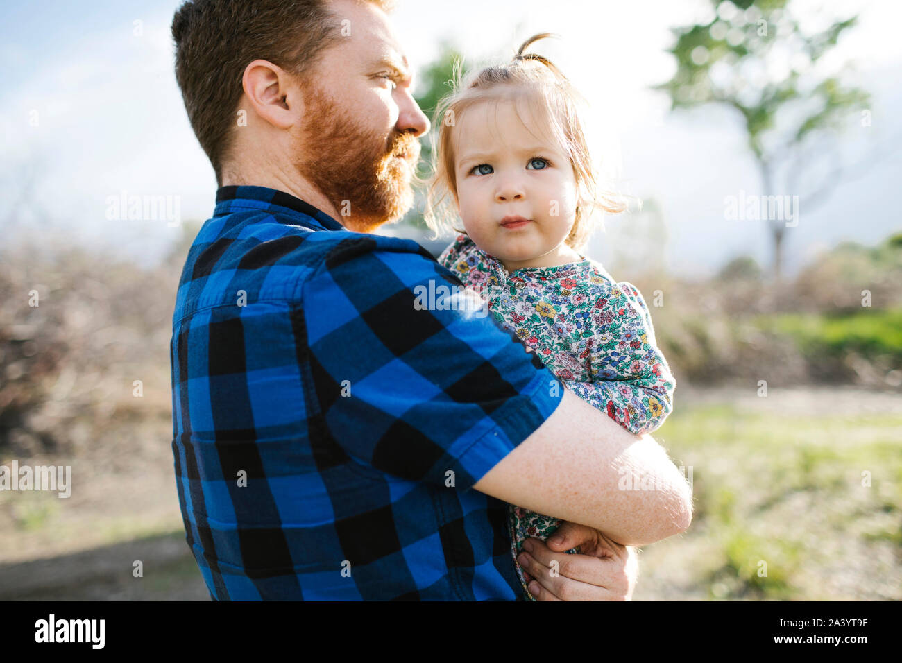 Father holding baby girl Stock Photo