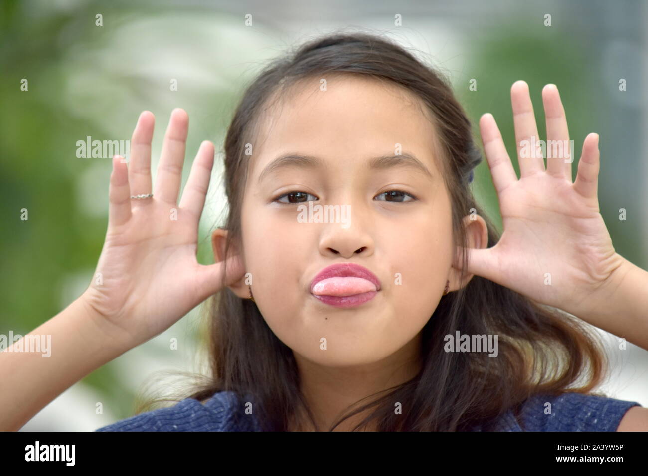 Female Making Funny Faces Stock Photo Alamy