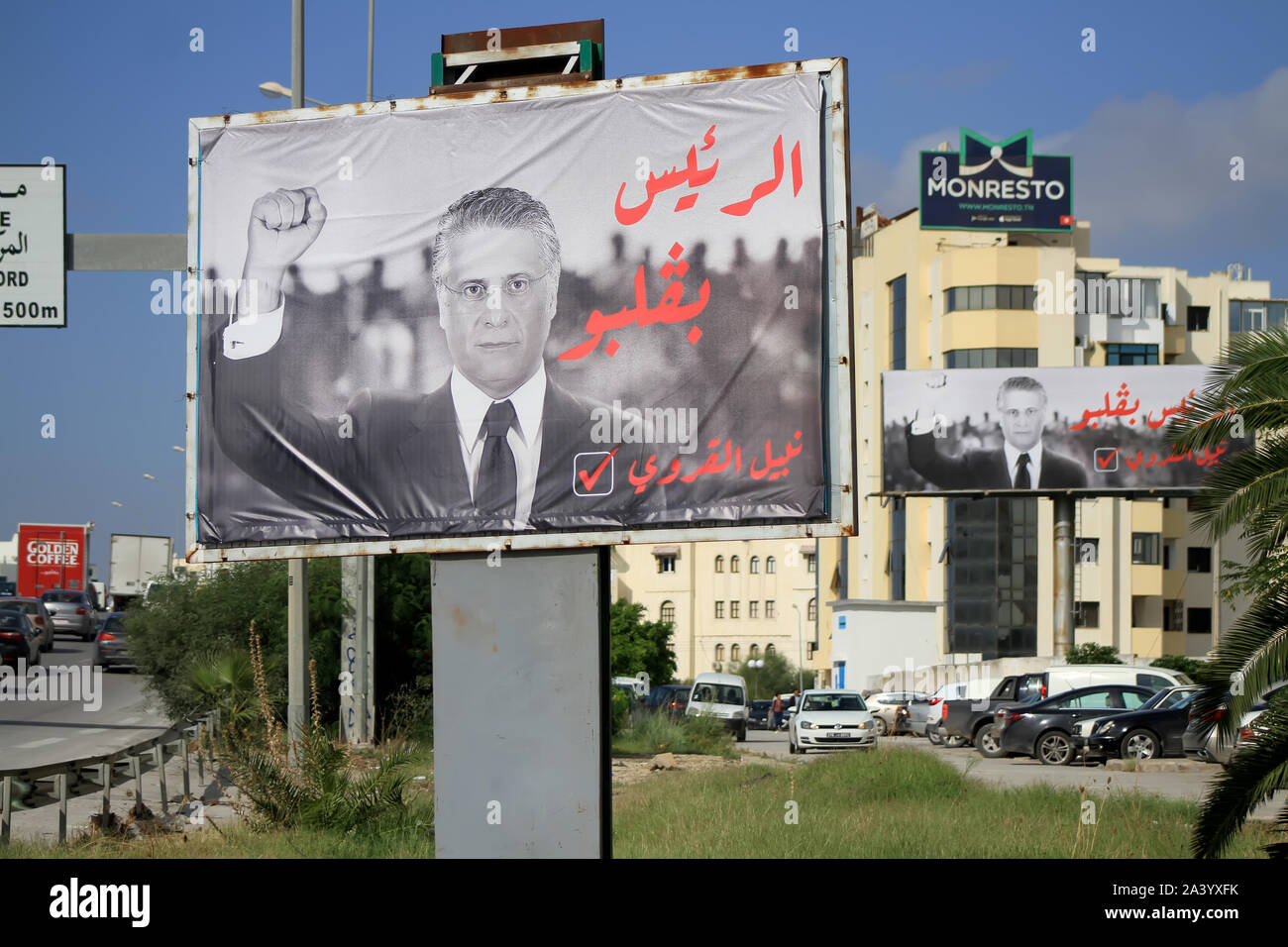 Tunis, Tunisia. 09th Oct, 2019. An electoral poster of Tunisian presidential candidate Nabil Karoui is pictured along the road in the capital Tunis. The slogan in Arabic reads: 'The president inside his heart'. Credit: SOPA Images Limited/Alamy Live News Stock Photo