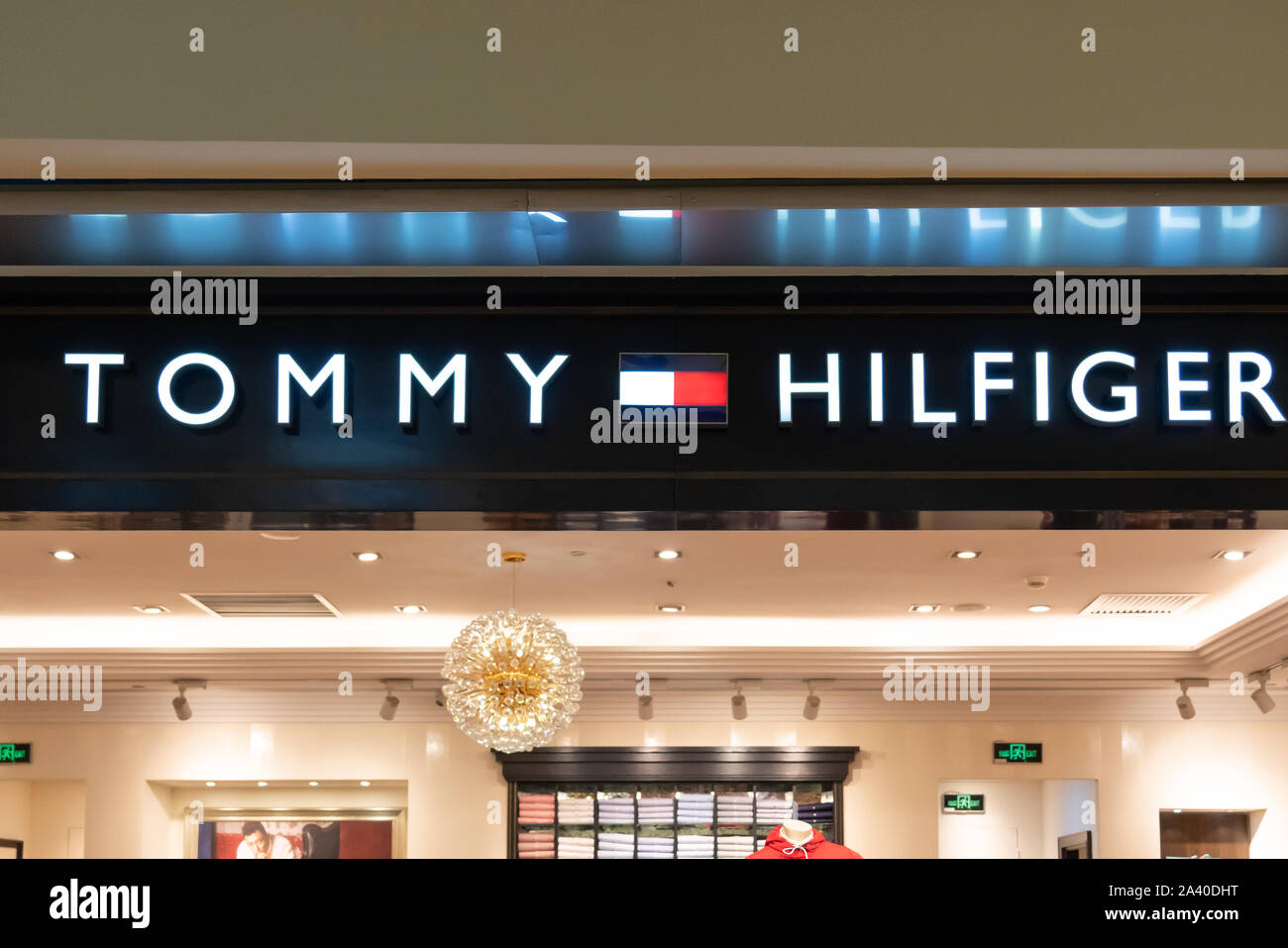 American premium clothing company Tommy Hilfiger store logo in Shenzhen Photo - Alamy