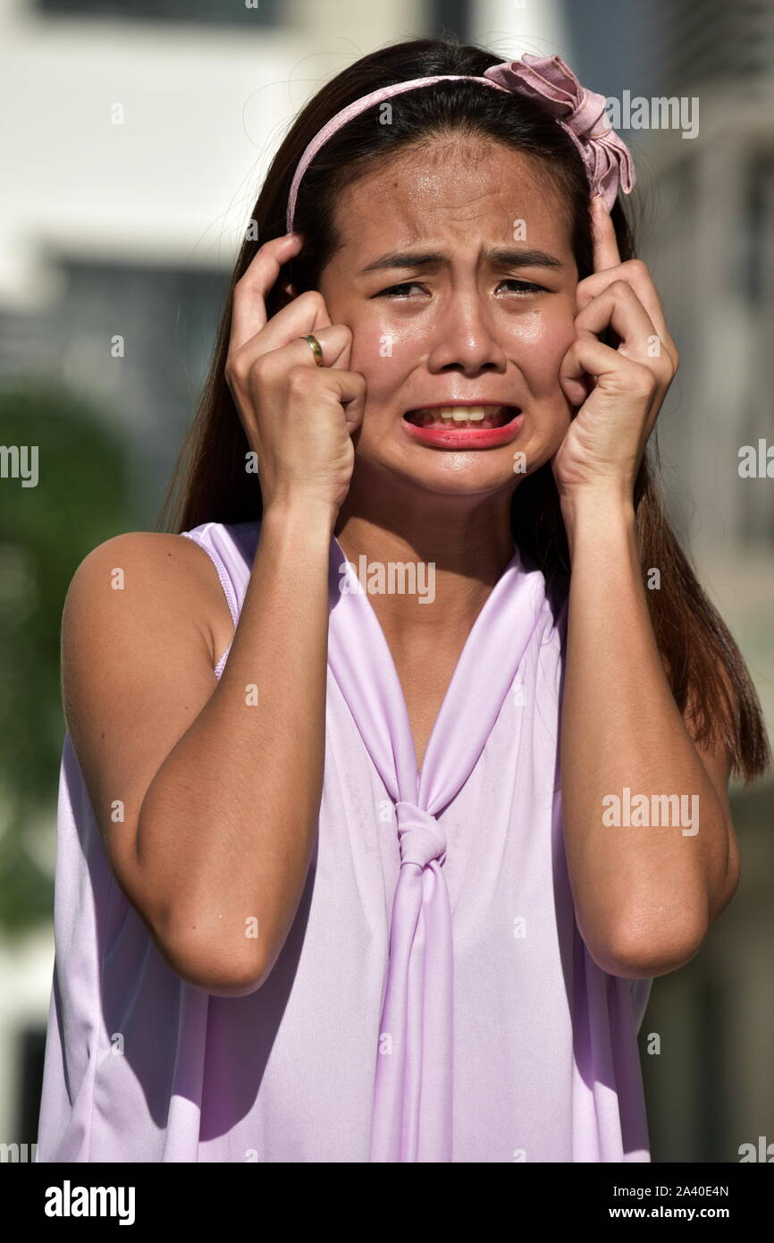 Older woman crying asian hi-res stock photography and images - Alamy