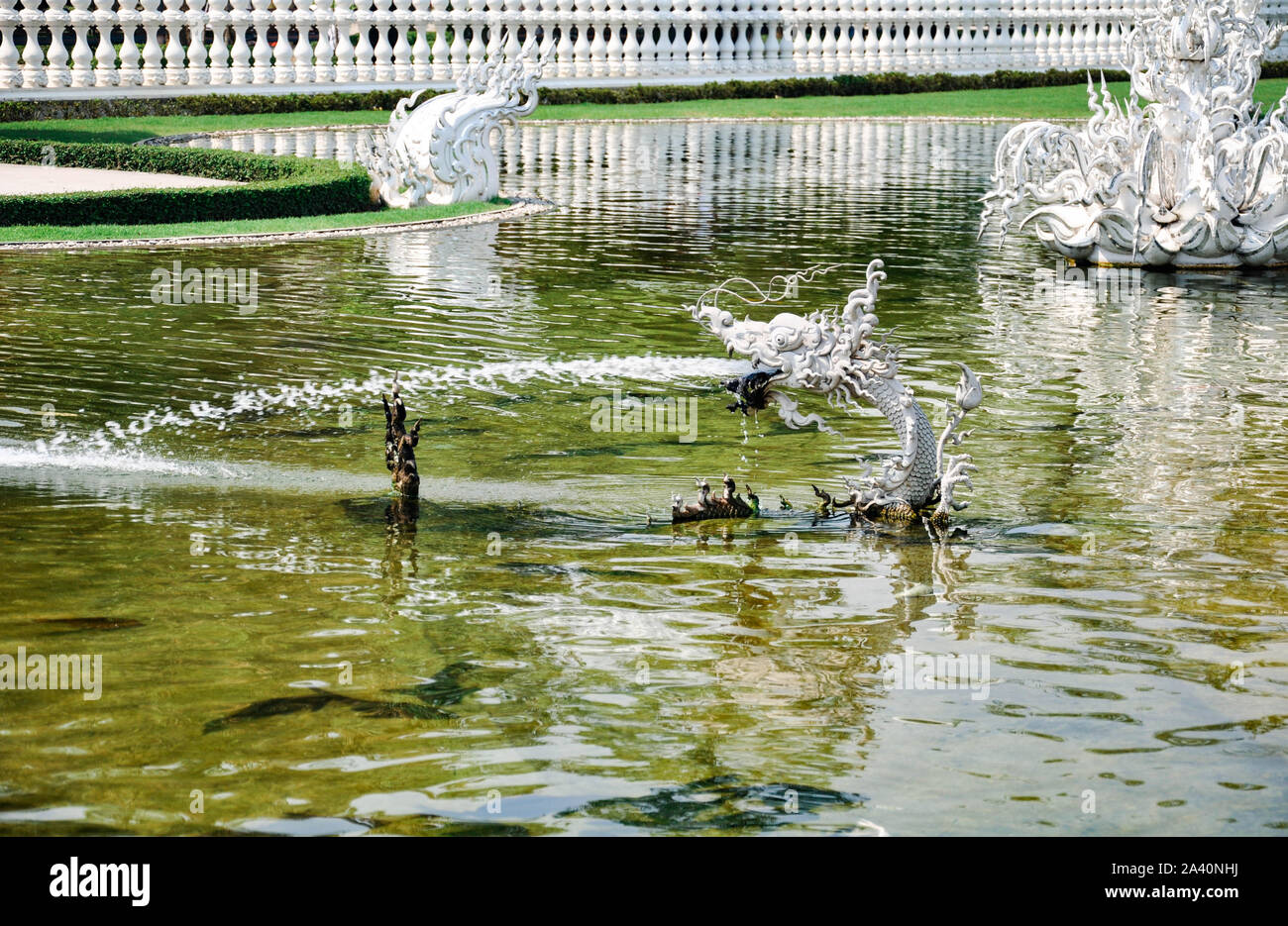 Thai Art Element A Water Dragon Fountain Near Of The White Temple thai-art-element-a-water-dragon-fountain-near-of-the-white-temple