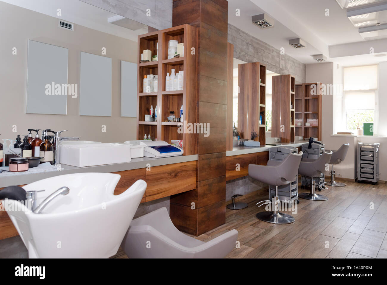 Hairdresser's workplace. Modern beauty salon. Hair salon interior business. Stock Photo