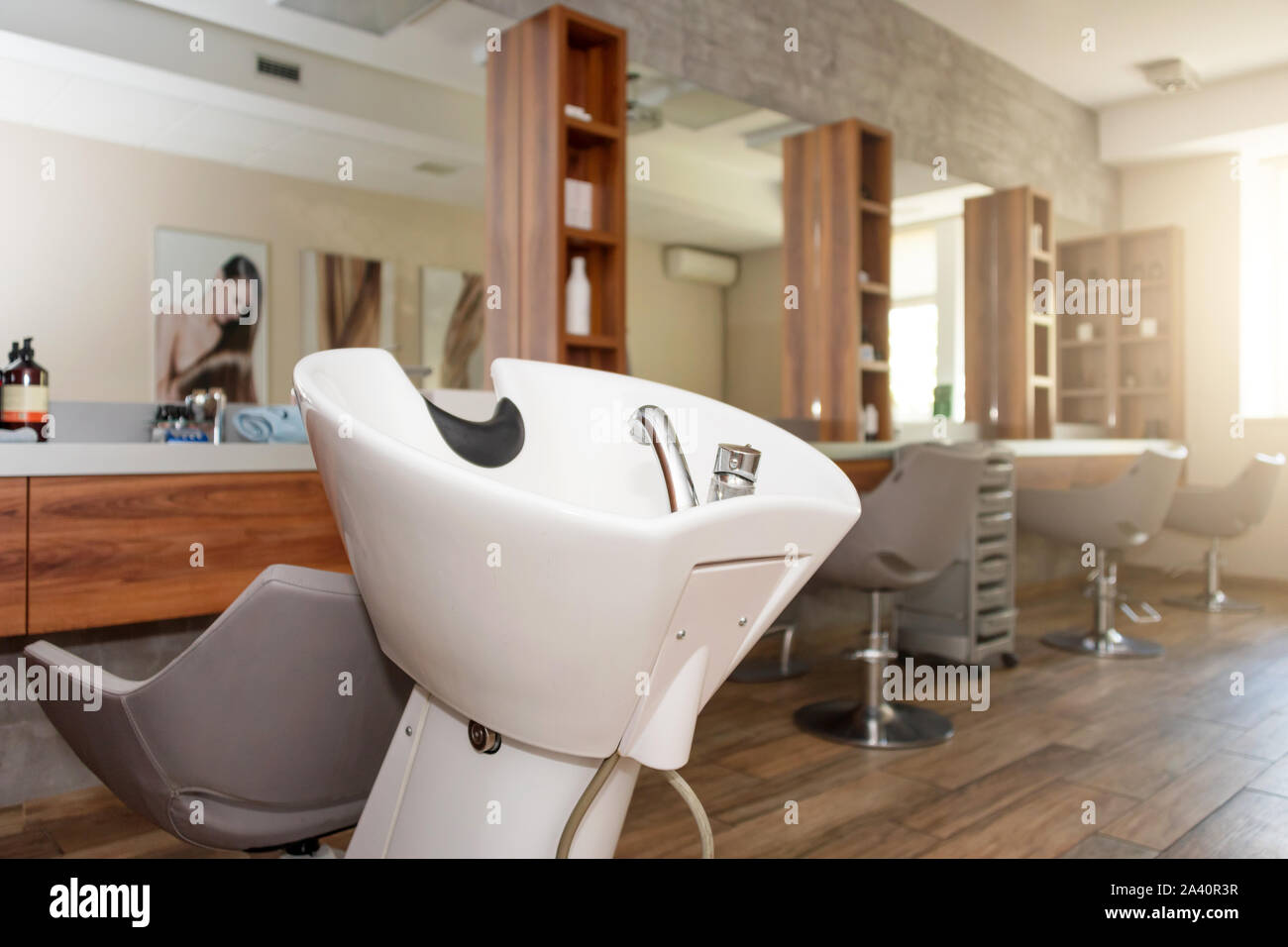 Hairdresser's workplace. Modern beauty salon. Hair salon interior business. Stock Photo