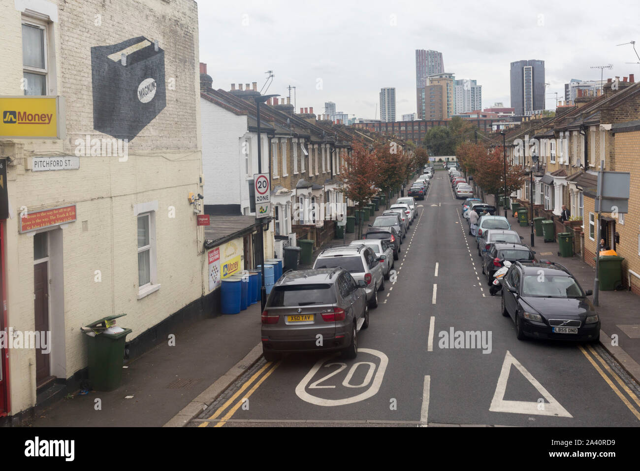An aerial landscape of cars parked on both sides of the residential Pitchford Street E15, a 20mph zone in Stratford, on 8th October 2019, in Rainham, Essex, England. Stock Photo