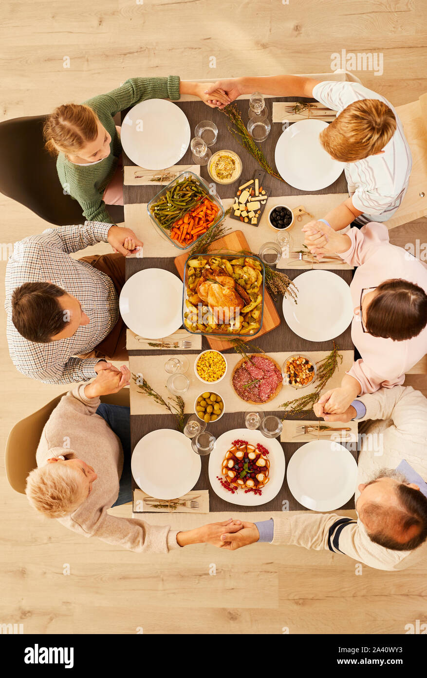 Family praying together meal dining hi-res stock photography and images ...