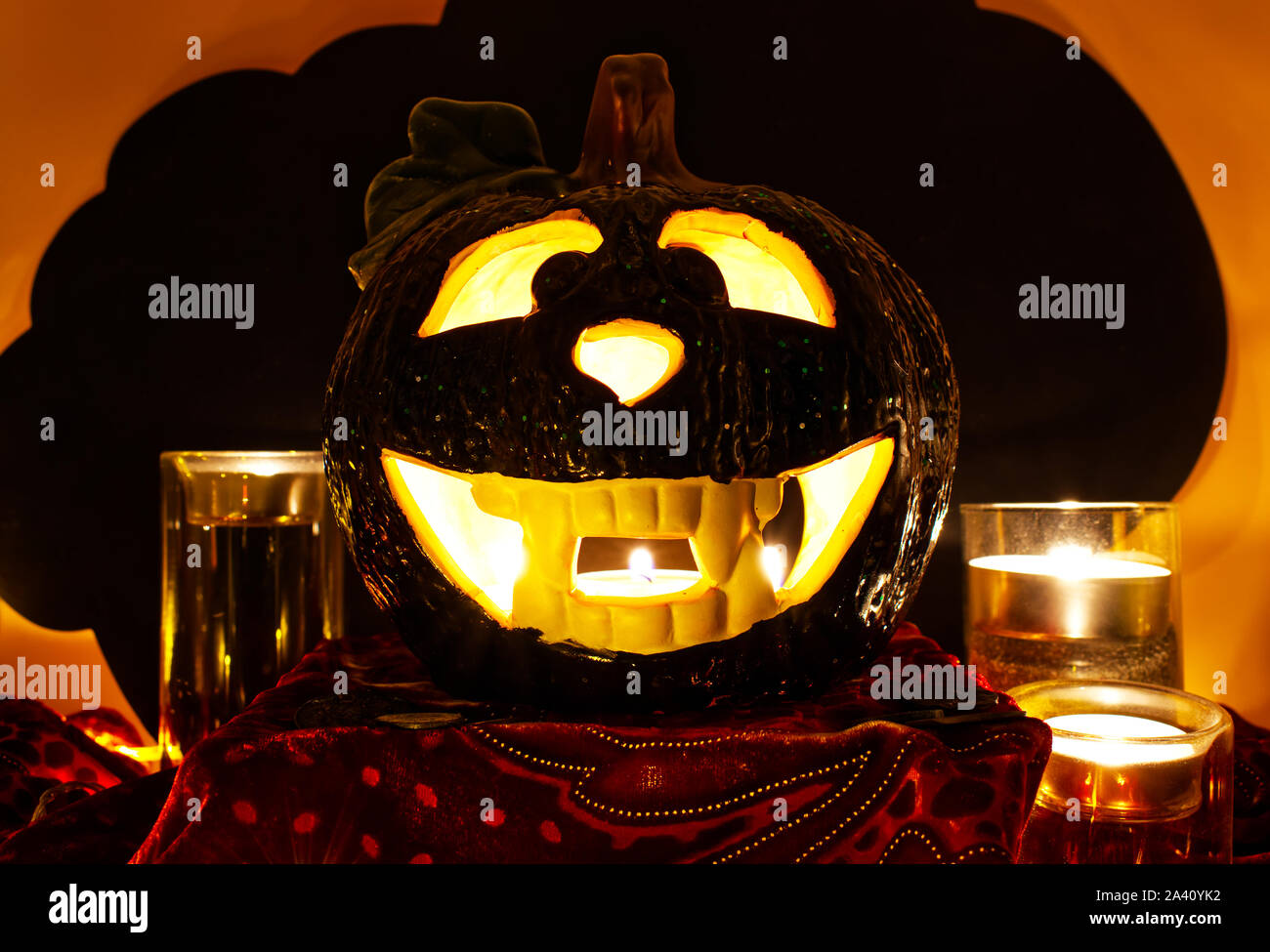 Halloween Pumpkin. Scary Jack O'Lantern on black cloud background and ...