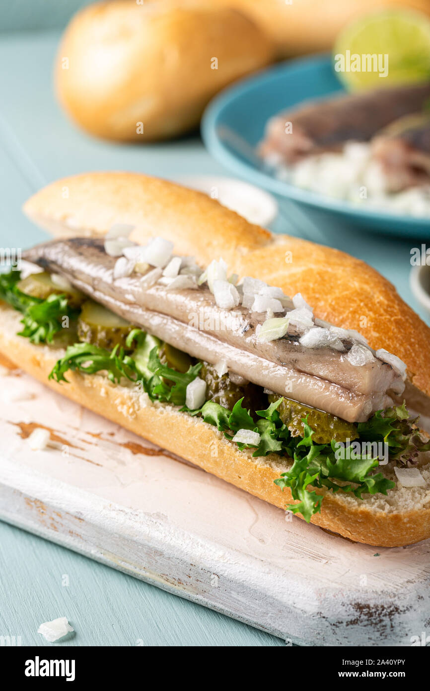 Traditional dutch snack, seafood sandwich with herring Stock Photo Alamy