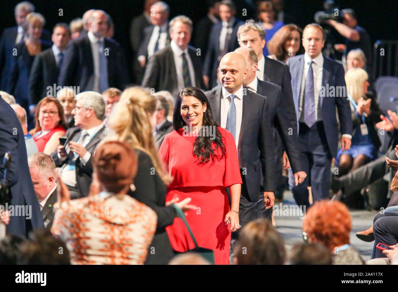 © Chris Bull. 02/11/19  MANCHESTER   , UK.    Conservative Party Conference 2019 at Manchester Central. Priti Patel leads leads out members of the cabinet into the auditorium ahead of Prime Minister Boris Johnson delivering his keynote speech on the final day of the conference (today Wednesday 2nd October 2019)    Photo credit: CHRIS BULL Stock Photo
