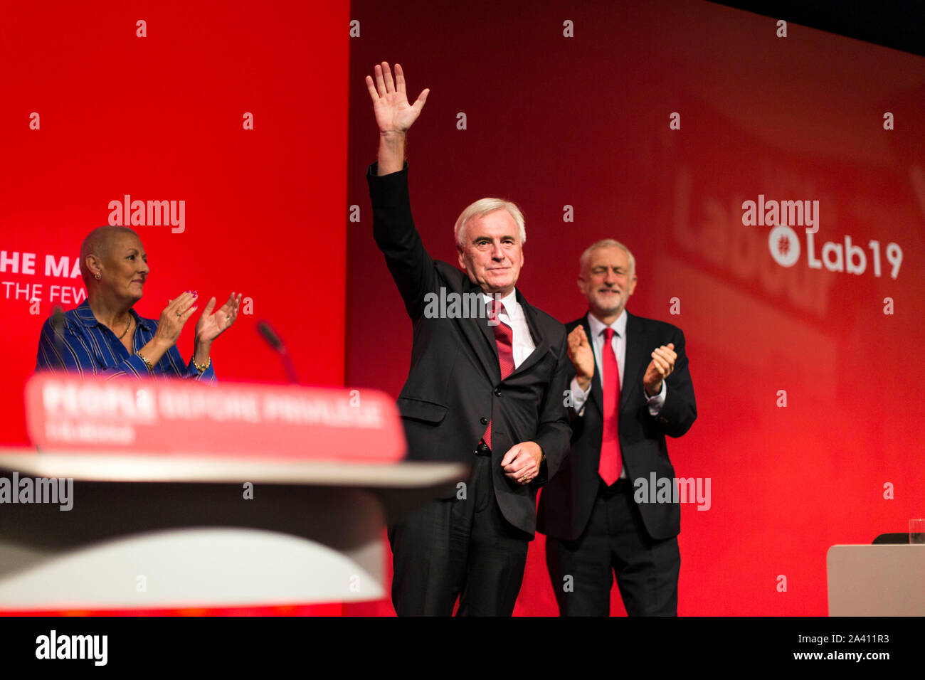 © Chris Bull. 23/09/19  BRIGHTON   , UK.    Labour Party Annual Conference 2019 in Brighton. John McDonnell  MP , Shadow Chancellor of the Exchequer is pictured today (Monday 23rd September) delivering his conference speech. Pictured on stage after his speech with Jeremy Corbyn.    Photo credit: CHRIS BULL Stock Photo