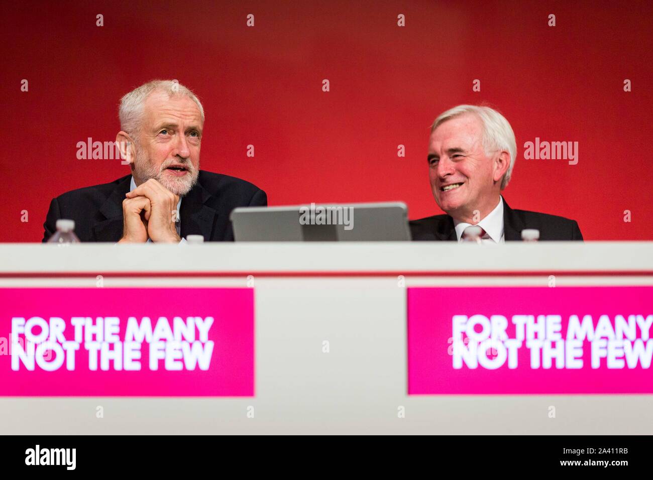 © Chris Bull. 23/09/19  BRIGHTON   , UK.    Labour Party Annual Conference 2019 in Brighton. John McDonnell  MP , Shadow Chancellor of the Exchequer is pictured today (Monday 23rd September) delivering his conference speech. Pictured on stage after his speech with Jeremy Corbyn.    Photo credit: CHRIS BULL Stock Photo