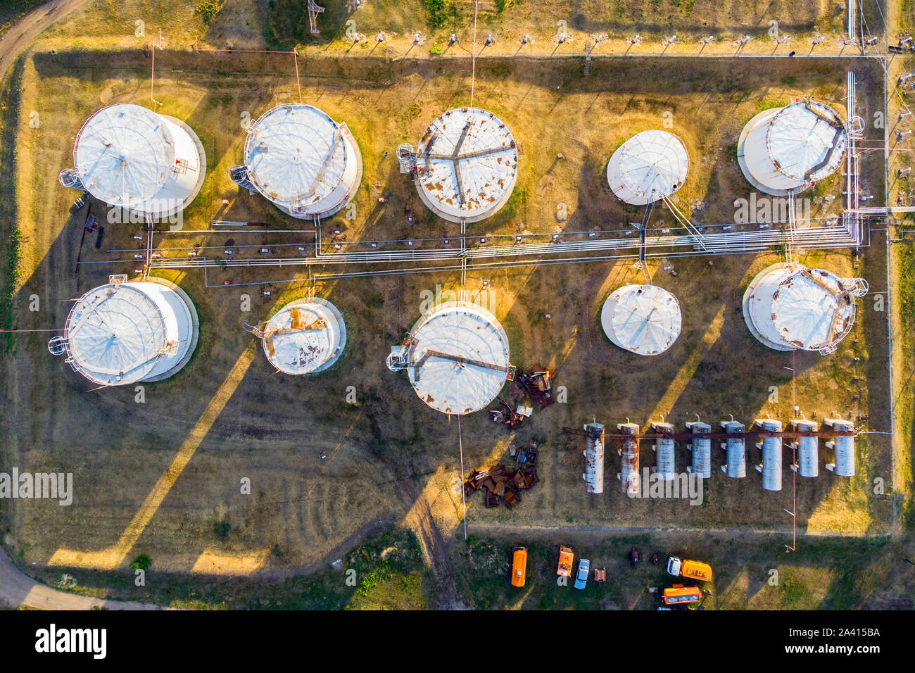 Liquid chemical tank terminal, Storage of liquid chemical and petrochemical products tank, Aerial view. The tank with petrol white color top view Stock Photo
