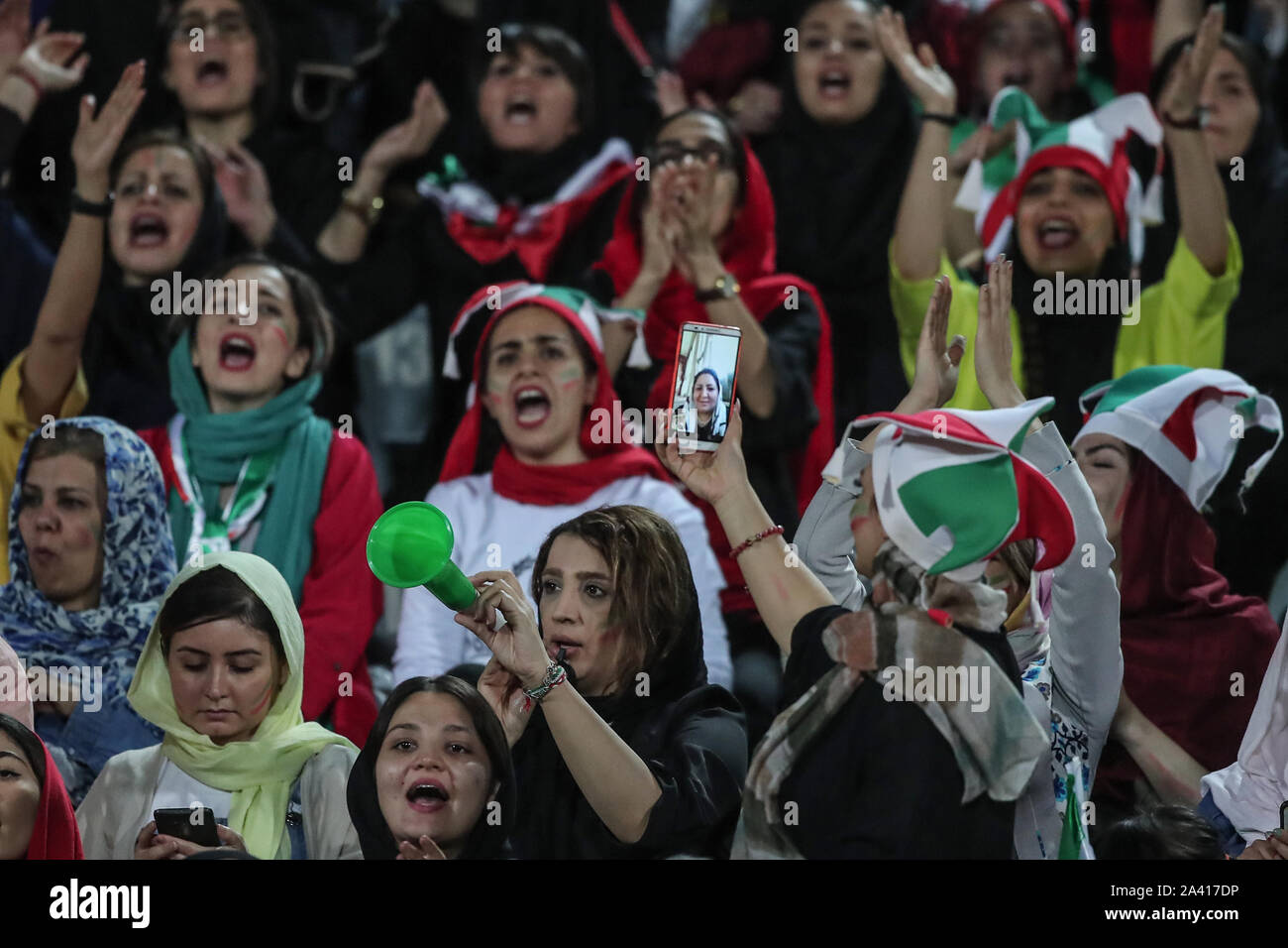 Tehran, Iran. 10th Oct, 2019. Iranian women attend the FIFA soccer ...