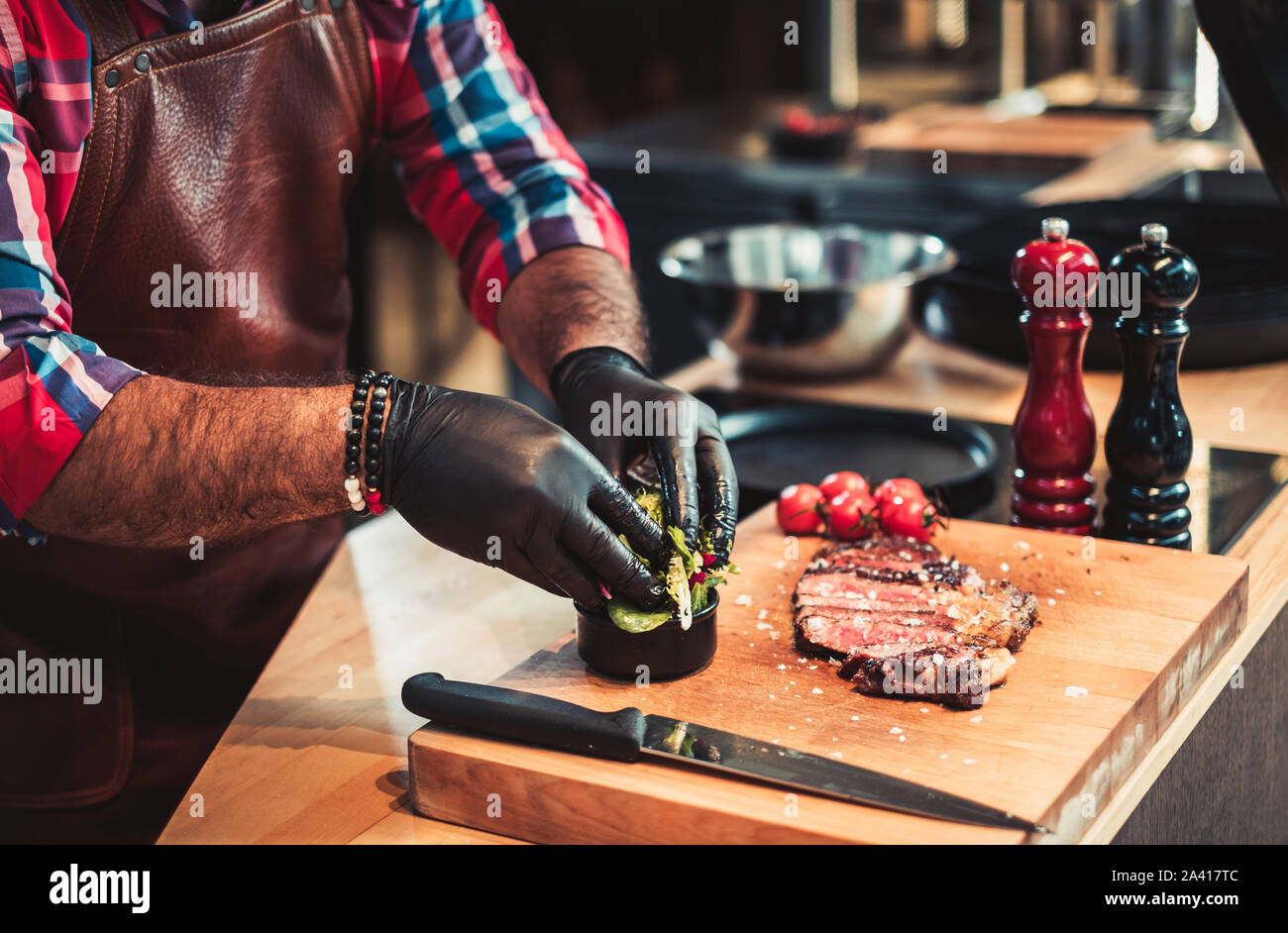 Chef serving freshly cooked meat in a restaurant Stock Photo Alamy