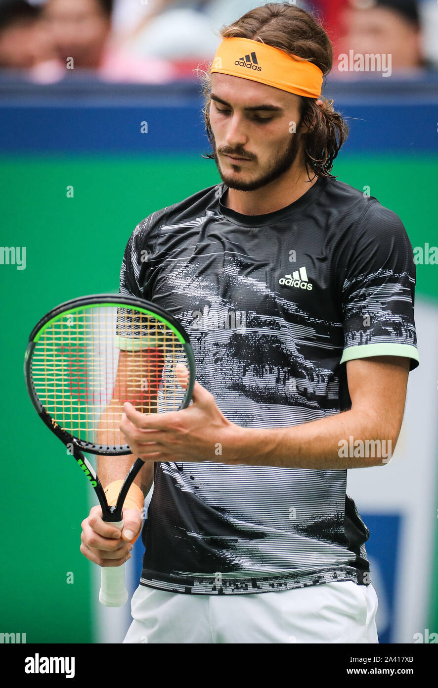 Greek professional tennis player Stefanos Tsitsipas competes against  Serbian professional tennis player Novak Djokovic during the quarterfinal  of 2019 Rolex Shanghai Masters, in Shanghai, China, 11 October 2019.  Serbian professional tennis player