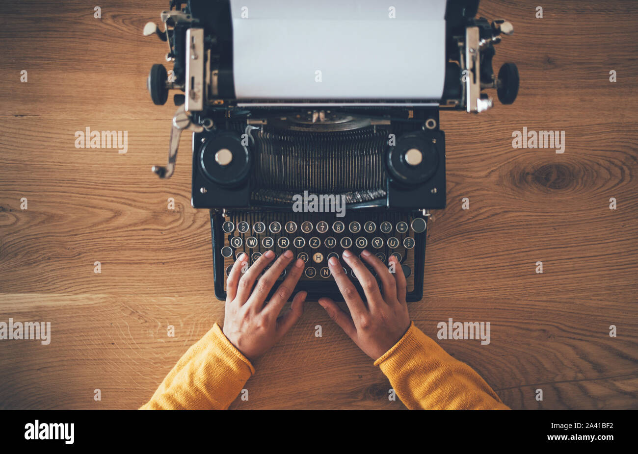 Typing on the vintage typewriter Stock Photo
