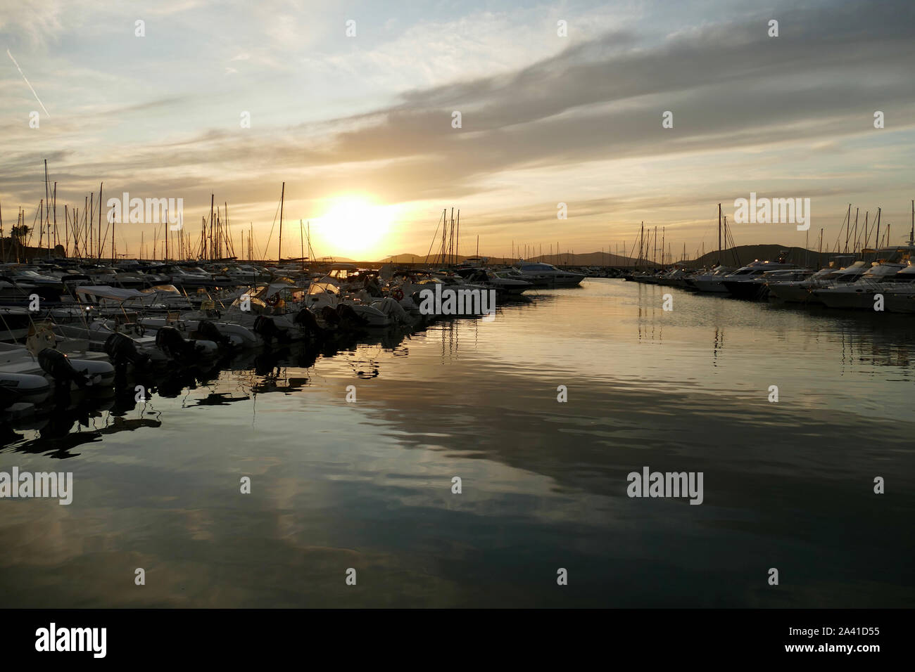 Panoramic view of marina at sunset. Colorful landscape on a summer night in Alghero, Sardinia, Italy. Stock Photo
