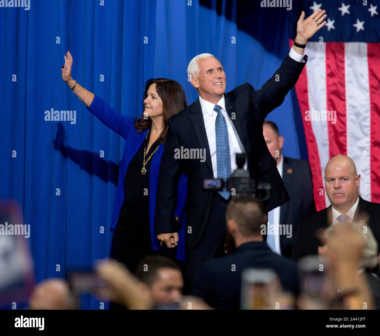 Minneapolis, Minnesota, USA. 10th Oct, 2019. Vice President MIKE PENCE and KAREN PENCE make their way towards the stage at a Keep America Great Rally at the Target Center. Credit: Brian Cahn/ZUMA Wire/Alamy Live News Stock Photo