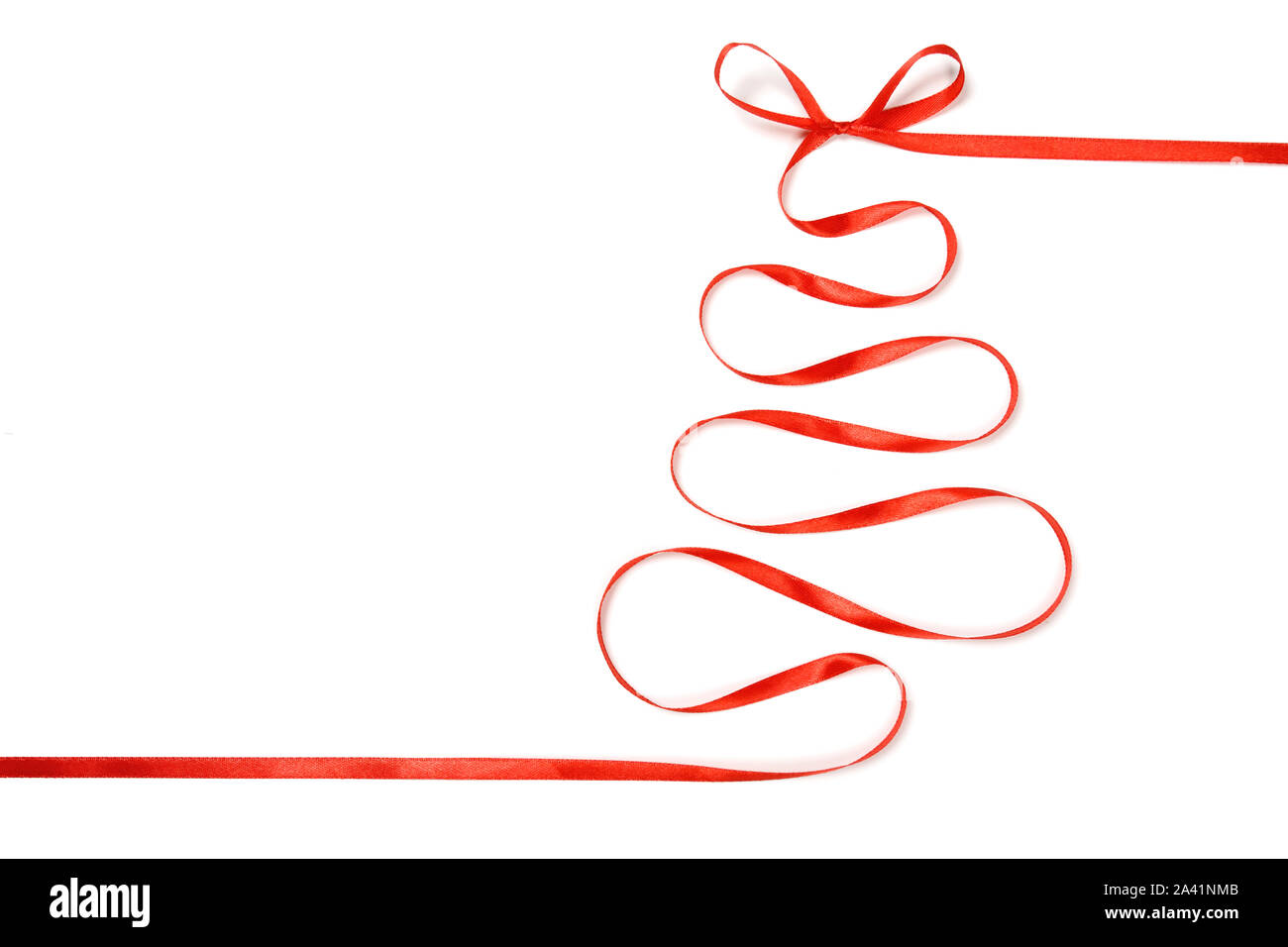 Red ribbon christmas tree isolated on white background Stock Photo - Alamy