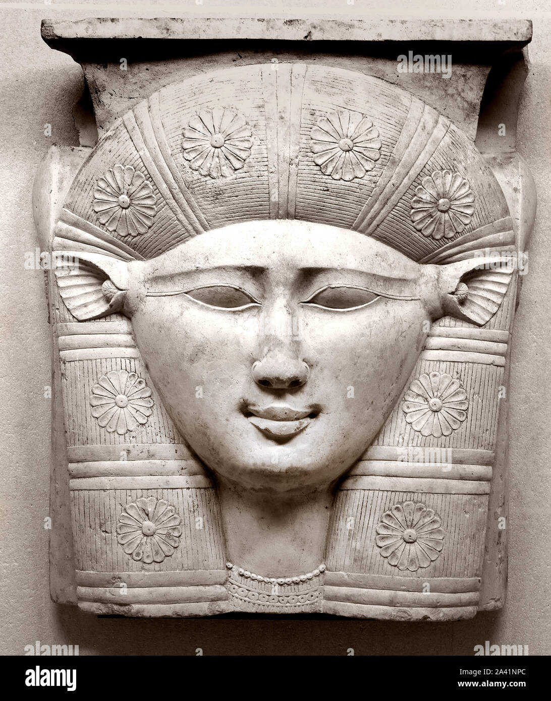 The face of the goddess Hathor, with cow's ears 3rd century BC fragment of the capital of a column limestone Egypt Egyptian Stock Photo