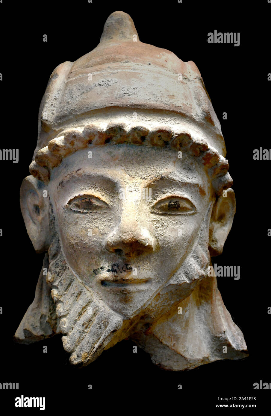 Bearded man with cap on hat 8th -5th Century BC ( Cypro-Archaic and Cypro-Classical periods (c. 750–300 BC)  8th - 5th century BC is characterized by instability due to frequent foreign intervention and domination of Cyprus.) Stock Photo