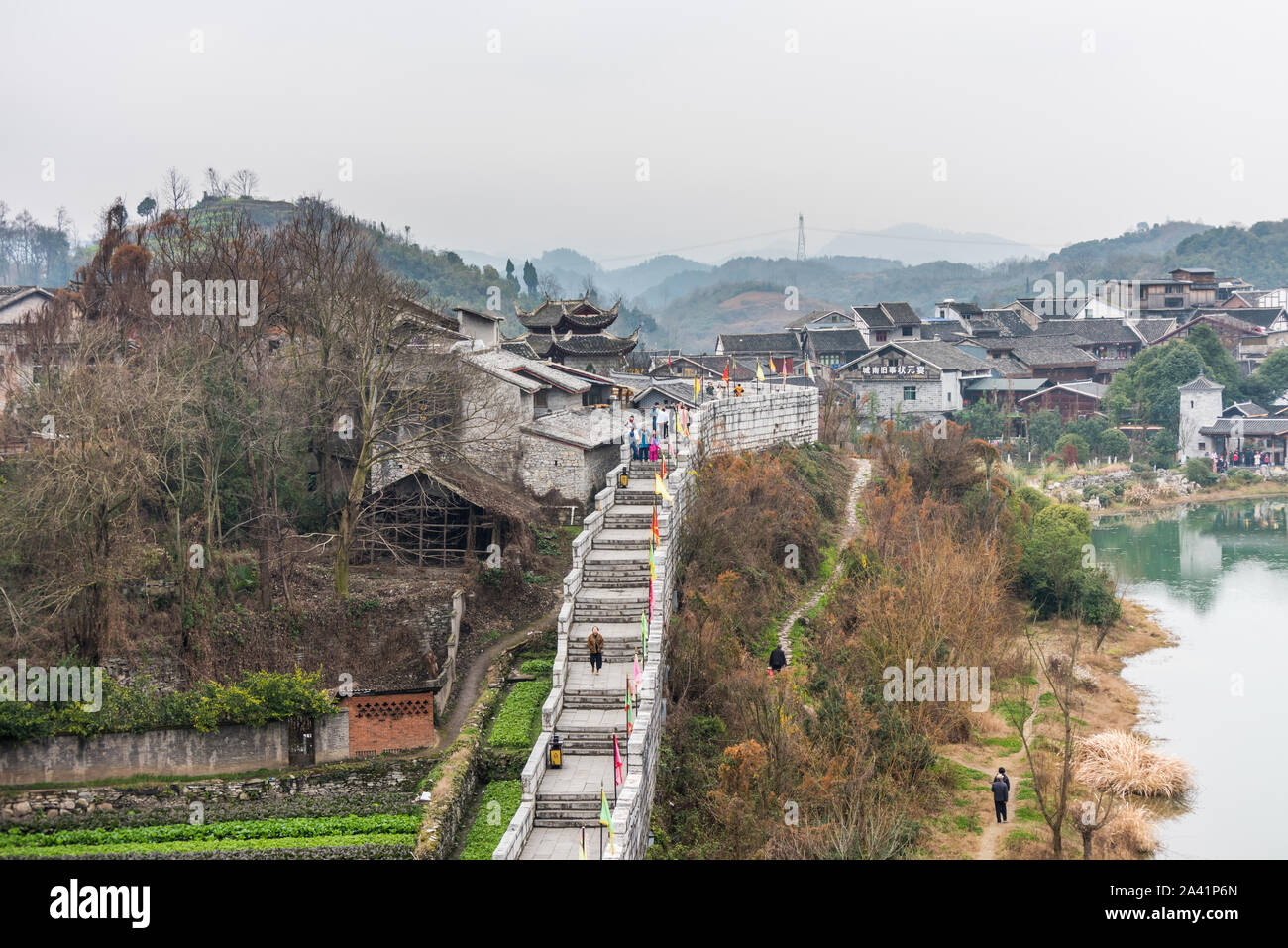 Ming Qing Dynasty Chinese traditional rural house, built with black tiles, stone, and bricks, in Qingyan Ancient town, one of famous old town and popu Stock Photo