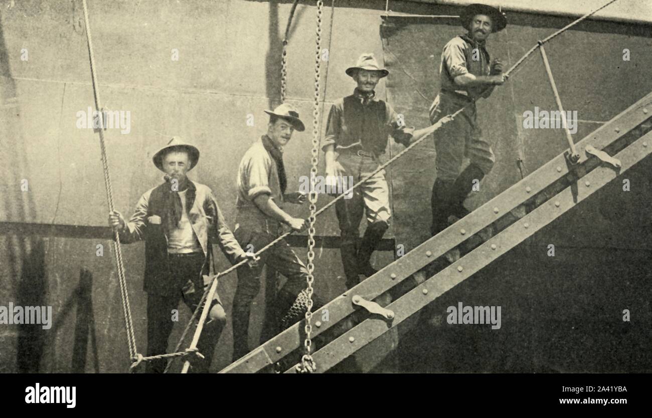 'The Last Photograph of Sergeant &quot;Willie&quot; Tiffany', Spanish-American War, 12 June 1898, (1899). '...Tiffany, Going Abroad the &quot;Matteawan&quot;, Sunday Afternoon, June 12th'. Left-right: (unknown man), William Tiffany, Henry Bull and Craig Wadsworth boarding a troopship at Port Tampa, Florida, USA. Tiffany (1863-1898) survived the Battle of San Juan Heights unhurt and was given a battlefield commission as a second lieutenant, but was among several Rough Riders who died of yellow fever or malaria. From &quot;The Little I saw of Cuba&quot; by Burr McIntosh, with photographs by the Stock Photo