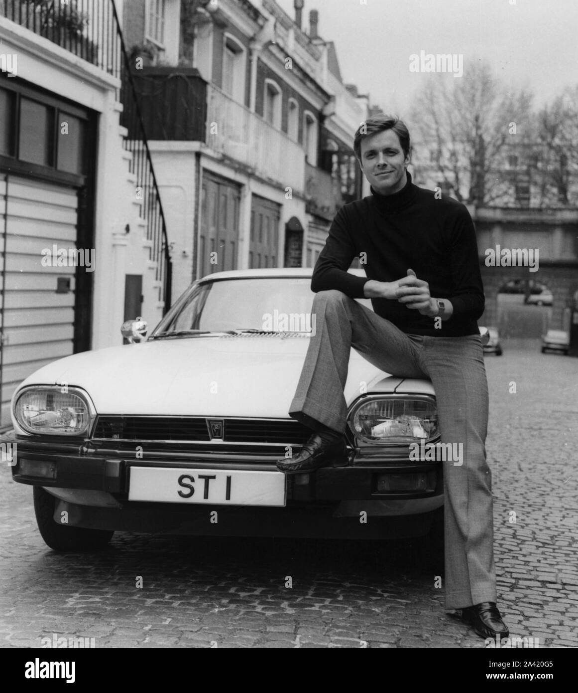 1977 Jaguar XJS with Ian Ogilvy as The Saint tv character. Stock Photo