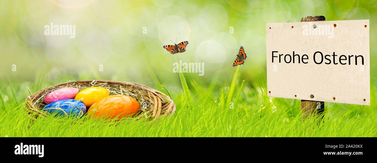 German Banner sign Happy Easter with Easter basket Stock Photo