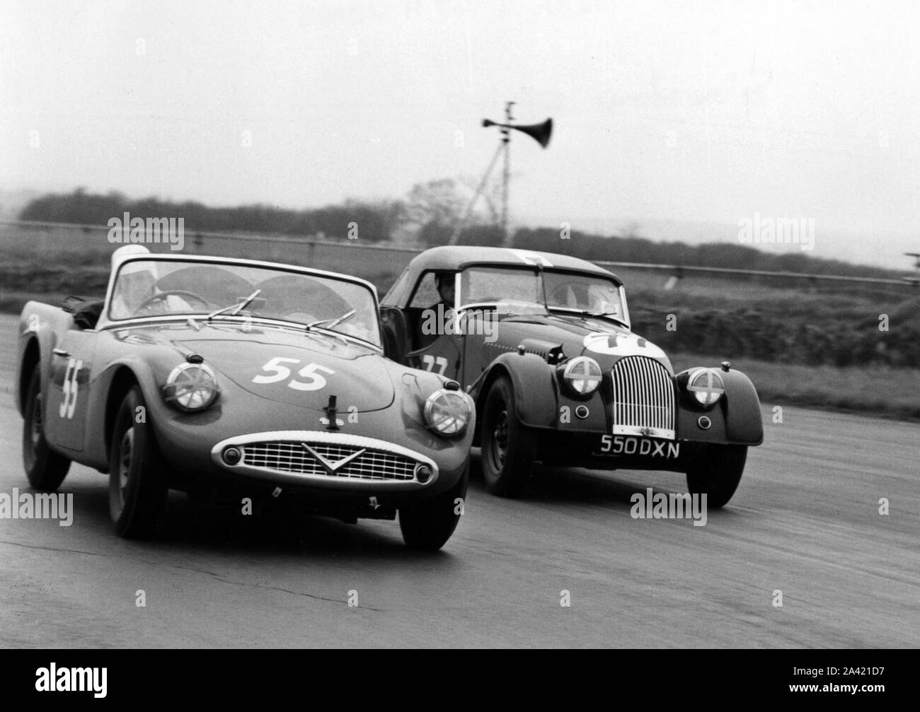 1961 Daimler SP250, Hon. B.Fielding and Morgan +4, Jones. At Silverstone. Stock Photo