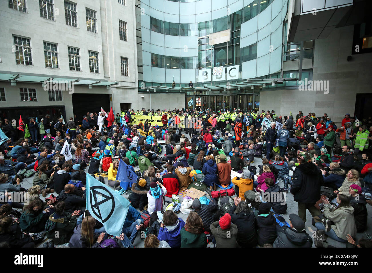 Protesters blocking the entrance to the BBC New Broadcasting House in ...