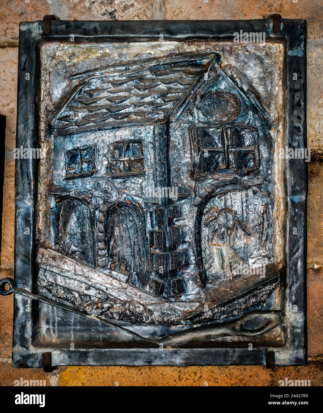 House of Lead Wall Plaque by Simon Moller, Market House, Winster Stock Photo