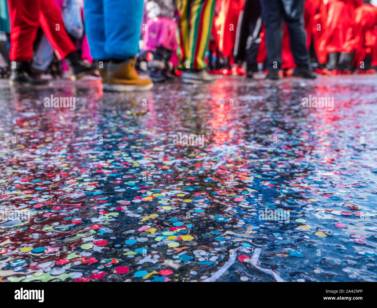 Confetti is reflected in a carnival parade Stock Photo
