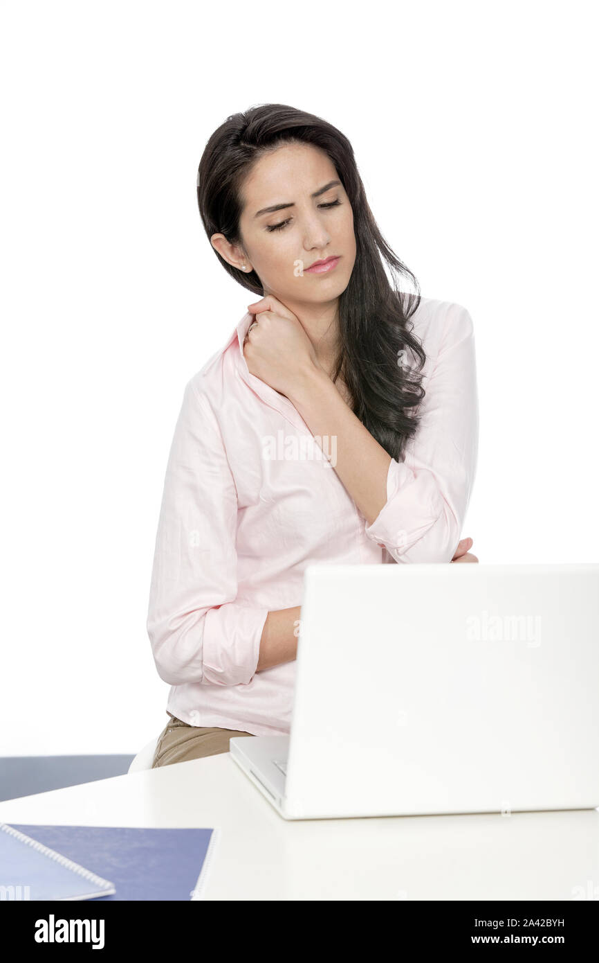 Beautiful young woman with neck pain at her office desk Stock Photo - Alamy