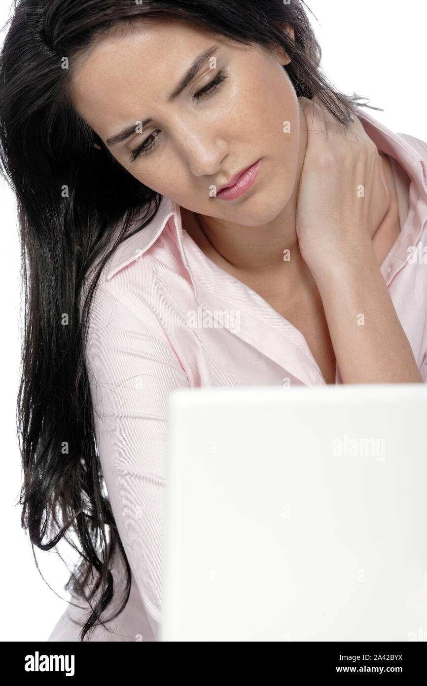 Beautiful young woman with neck pain at her office desk Stock Photo - Alamy