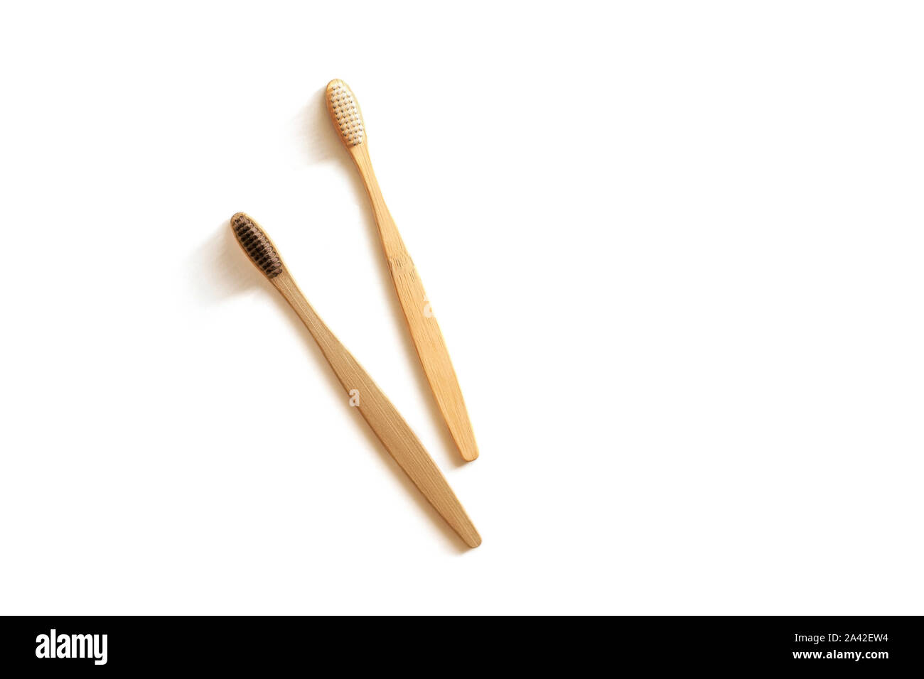 Two bamboo toothbrush isolated on white background. Zero waste concept ...
