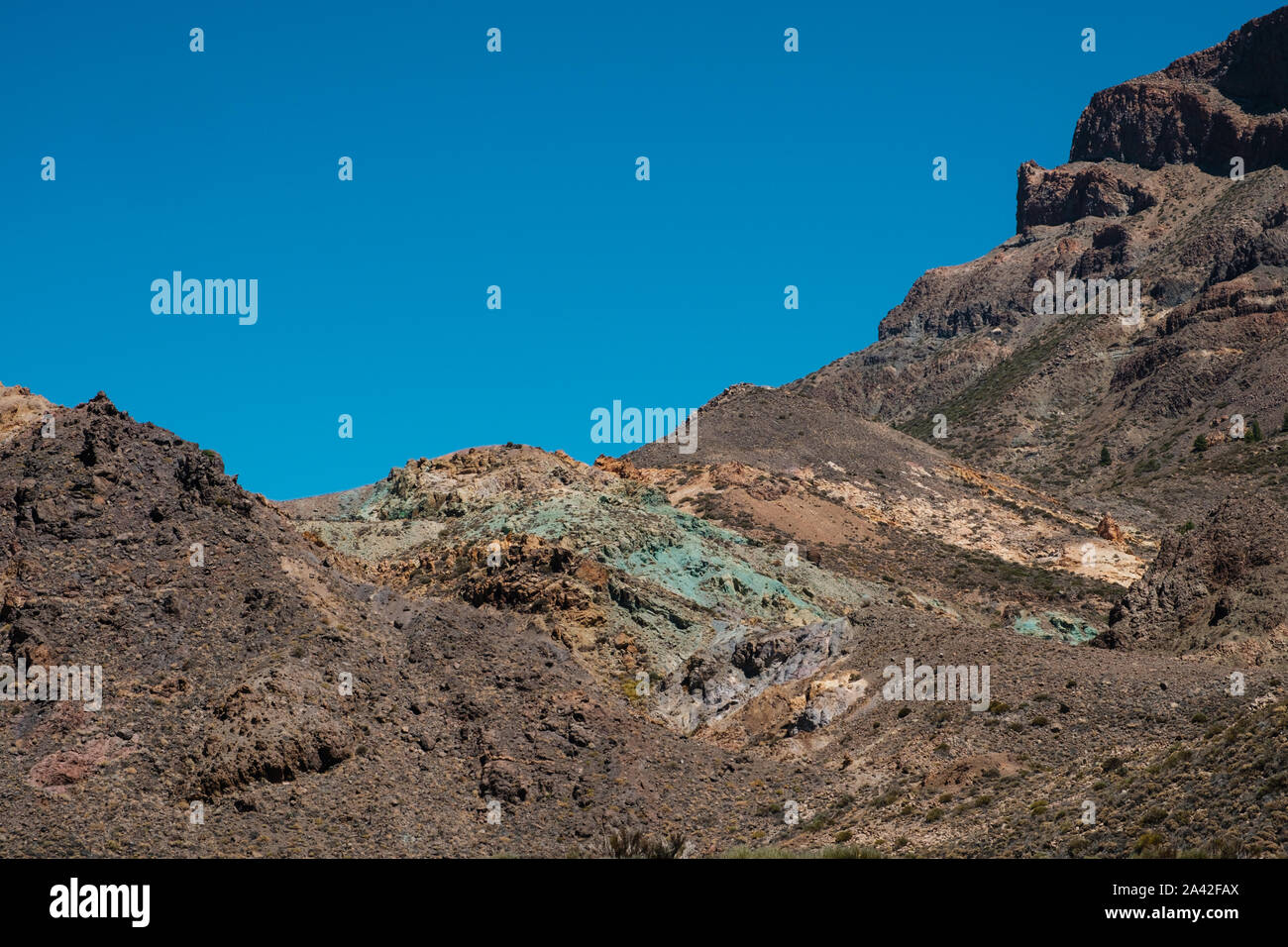 green rocks in mountain, volcanic landscape, Teide, Tenerife Stock Photo